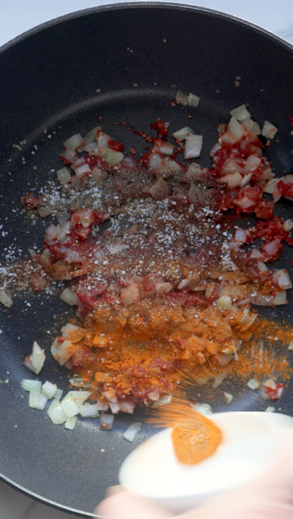 diced onion and garlic and tomato paste and varied seasonings with the gulpea korma